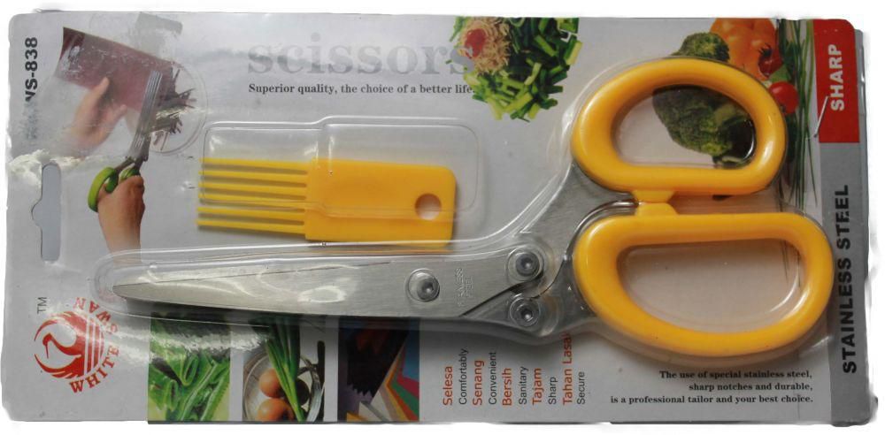 Scissors cutting vegetables