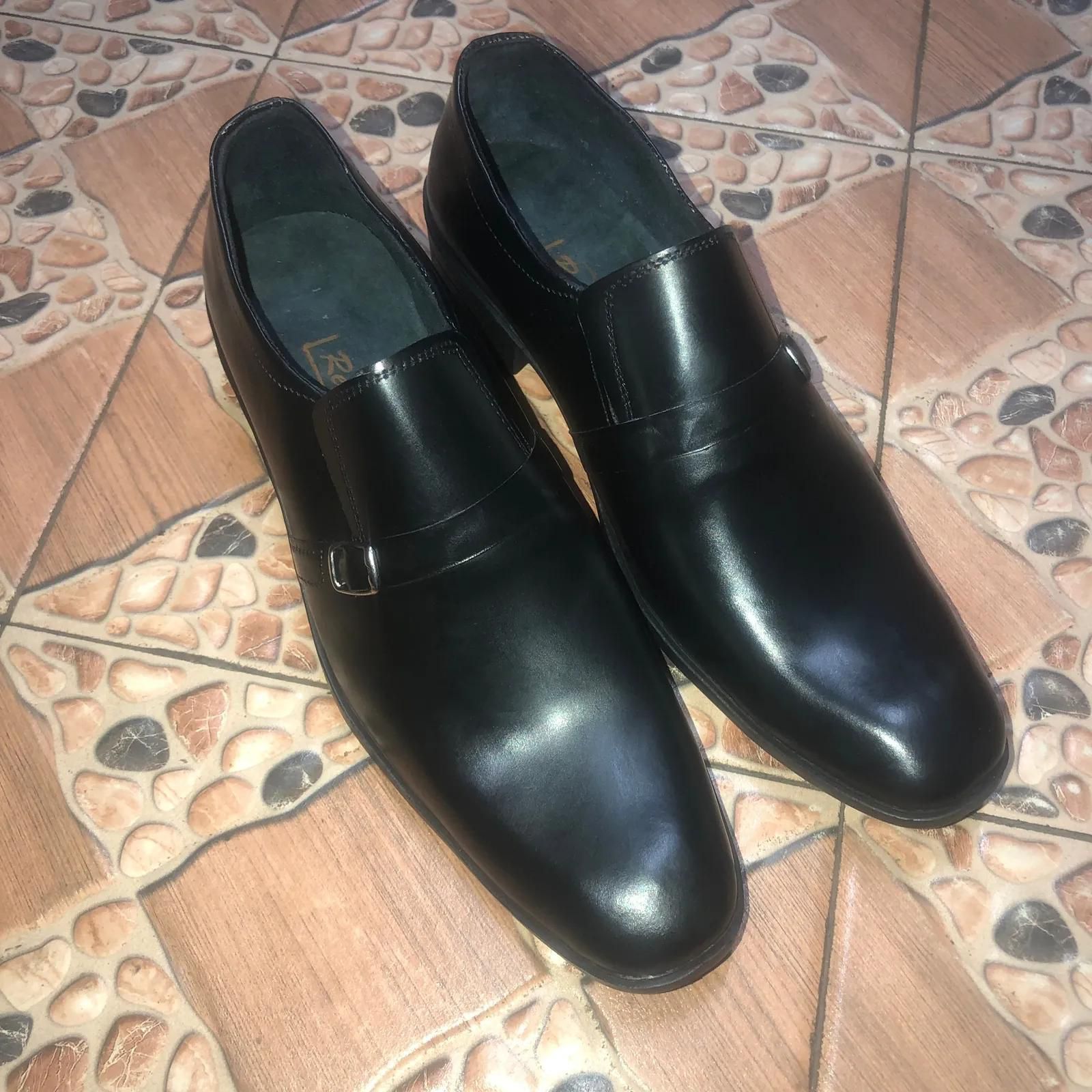 Black official leather shoes.