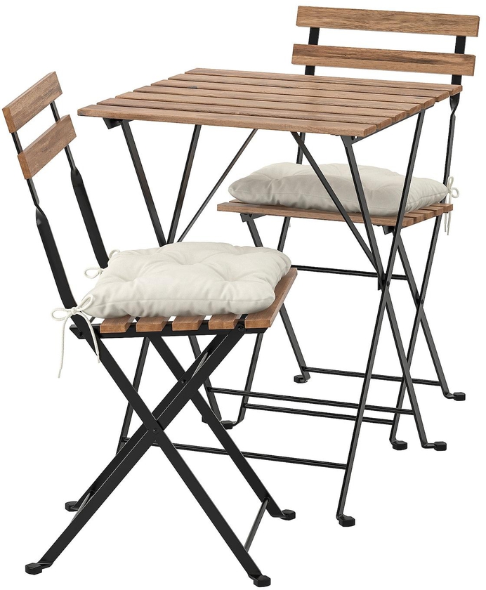 TÄRNÖ Table+2 chairs, outdoor - black/light brown stained/Kuddarna beige