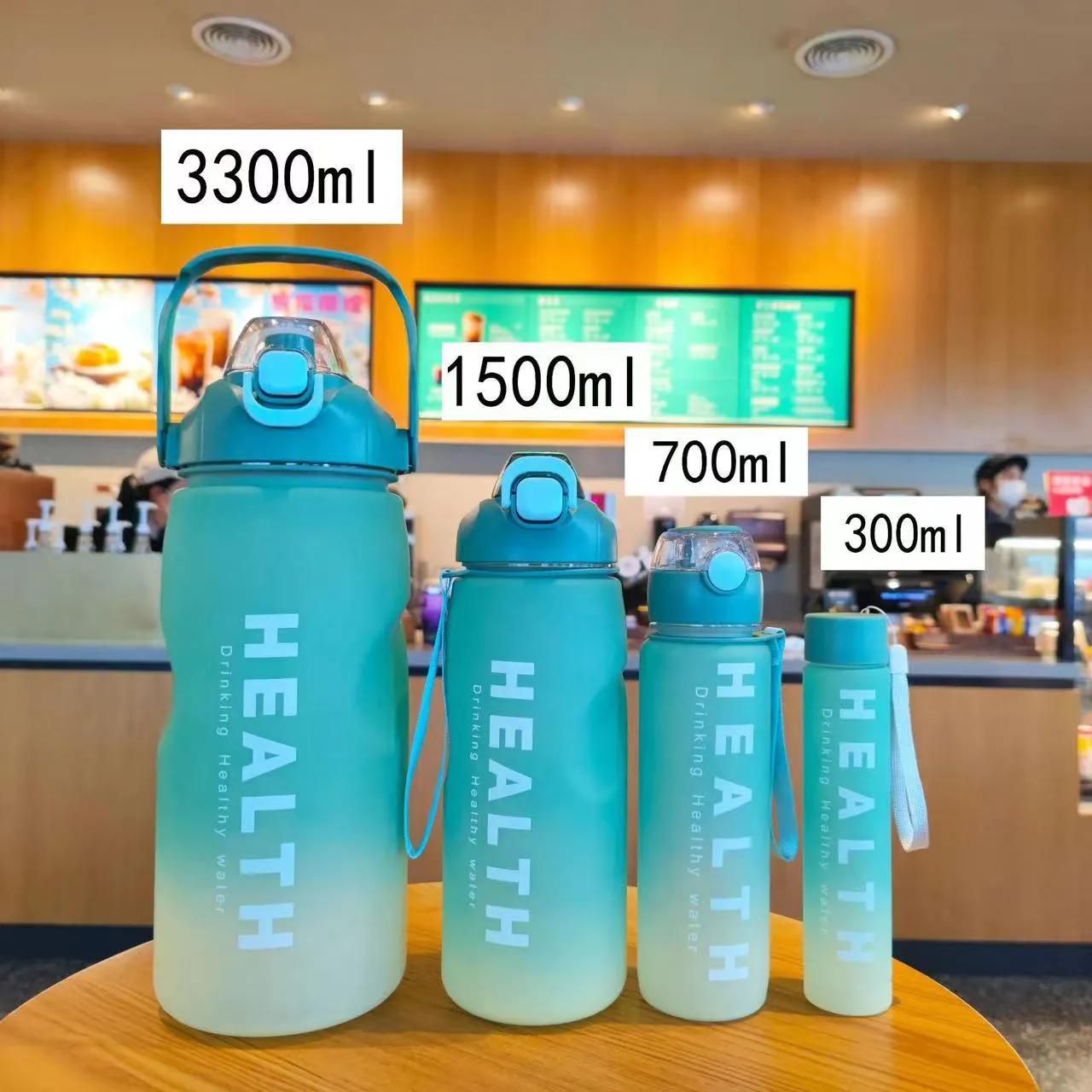 4-in-1 Set Motivational Water Bottle with Time Marker,Straw,Leakproof for Family, Gym, Camping, Outdoor Sports 4 piece set of super capacity, press the spring cover and open the co