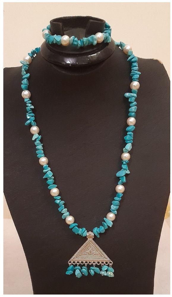 A Beautiful Necklace And Bracelet Of Turquoise And Off White Beads