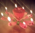 شمعة موسيقية انيقة بتصميم زهرة اللوتس لاعياد الميلاد - 5 قطع