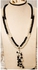 A Beautiful Necklace Of Off White And Black Beads