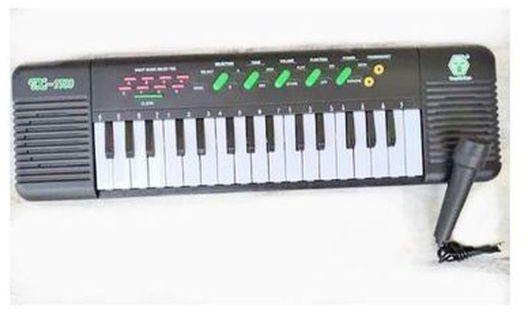 32 Keys Electronic Keyboard With Microphone TX7700