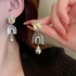 925 silver needle zircon relief hollowed-out birdcage zircon pearl earrings fashion creativity light luxury temperament earrings minority ins personality earrings
