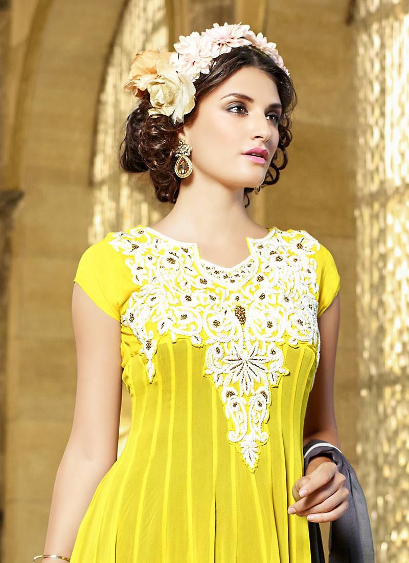 Attractive Georgette Fabric Yellow Unstitched Gown by Brithika