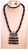 A Beautiful Necklace Of Black Beads With Silver Pendant