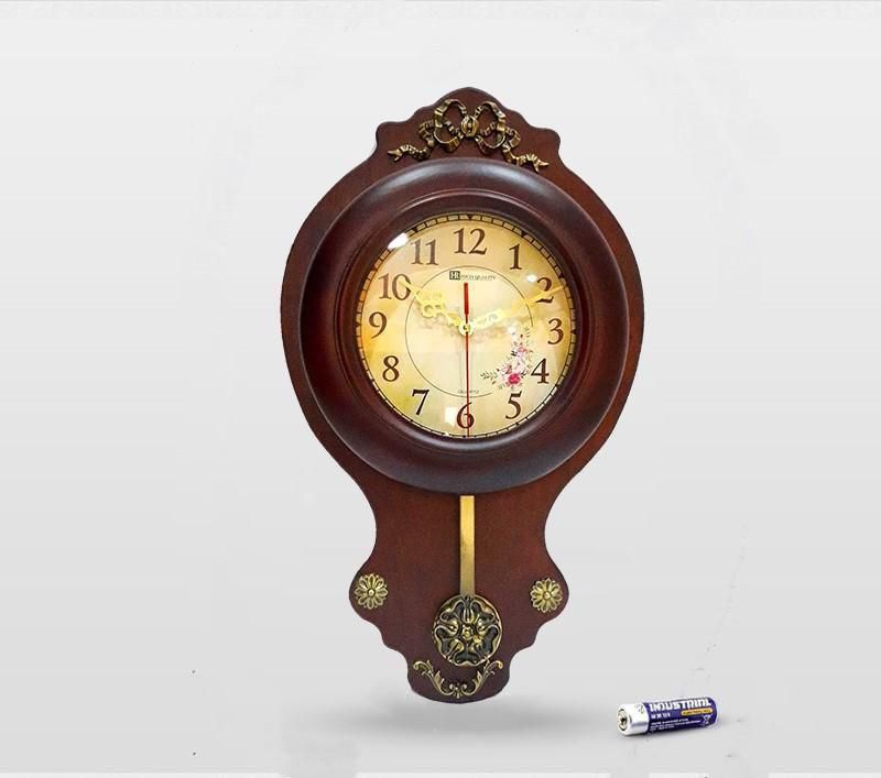 Classic wooden wall clock with pendulum