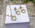 3Diamonds مجموعة مجوهرات مطلية بالذهب على شكل قلب - رمز الحب المشع