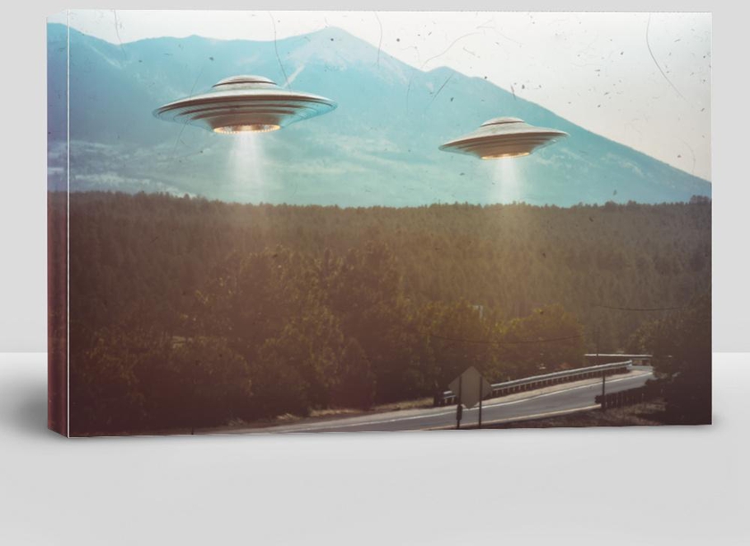 Unidentified Flying Object. Two Ufos Flying Over a Road Among the Tree