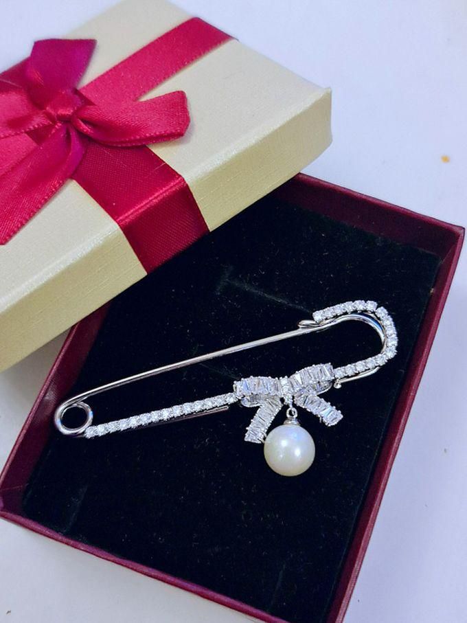 Baguette Bow And Pearl Studded Brooch And Clothes Pin