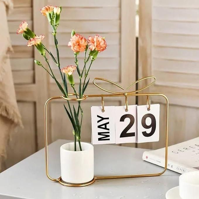 Metal Calendar With Porcelain Vase