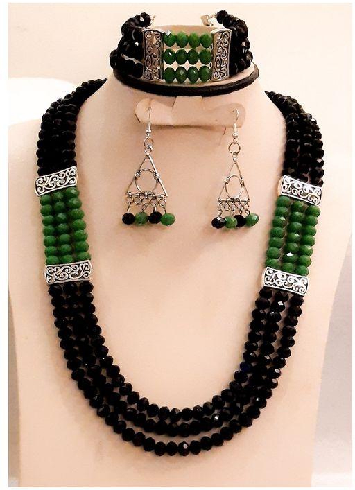 A Beautiful Set Of Green And Black Beads