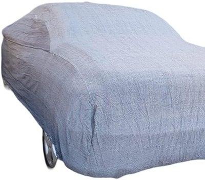 A cover made of treated jeans to protect the car from dirt and sun SKODA Felecia