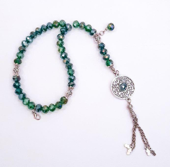 A Beautiful Prayer Beads Of Green Beads With Lock