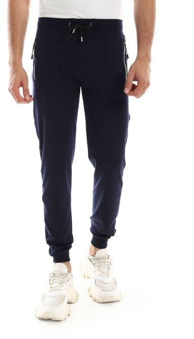 Caesar Detailed Casual Sweatpants With Zipper Pockets And Silver Tape