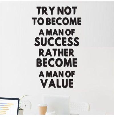 ملصق جداري بتصميم اقتباس "Try Not To Become a Man Of Success. Rather Become A Man Of Value" أسود 40X30سم
