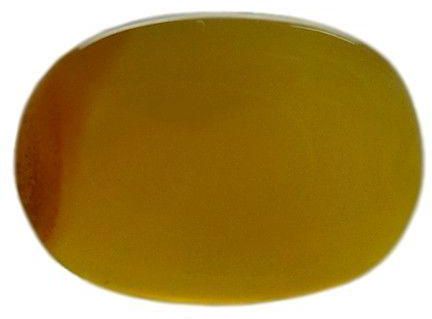 حجر عقيق يماني اصفر اللون  بيضاوي الشكل  بوزن 6.5 قيراط