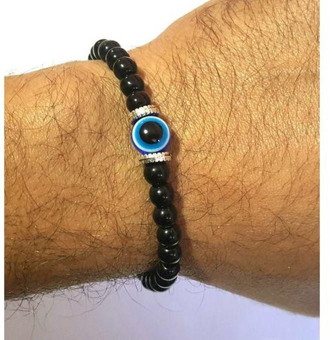Black Beads Bracelet With A Blue Eye