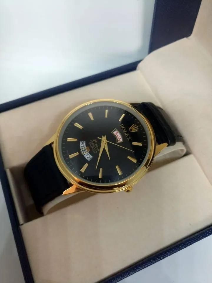 Rolex watch day date golden normal
