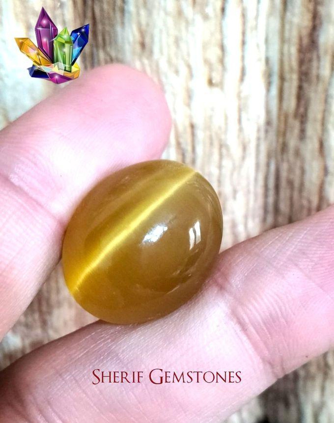 Sherif Gemstones قطعة نادرة من حجر عين الهر الذهبي الرائع وزن 45 قيراط كما بالصورة