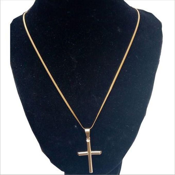 Gold Cross Pendant On Gold Cuban Chain Necklace