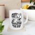 Skeleton Drinking Coffee Mug "Coffee Raises Me From The Dead" مج مطبوع