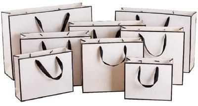 10 Packed White With Black Border Shopping Paper Bags. Size :H22*L16*D8cm (Vertical)
