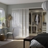 SKYTTA / PAX Walk-in wardrobe with sliding doors - white Hokksund/high-gloss light grey 301x160x240 cm