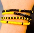 Fashion Rubber Stick 4pcs Black & Yellow Color Bracelet