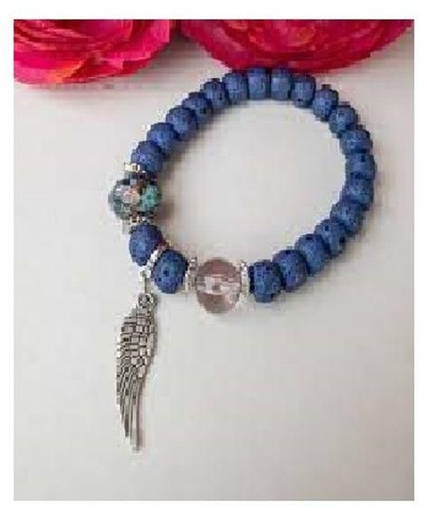 A Dark Blue Bracelet With A Silver Wing