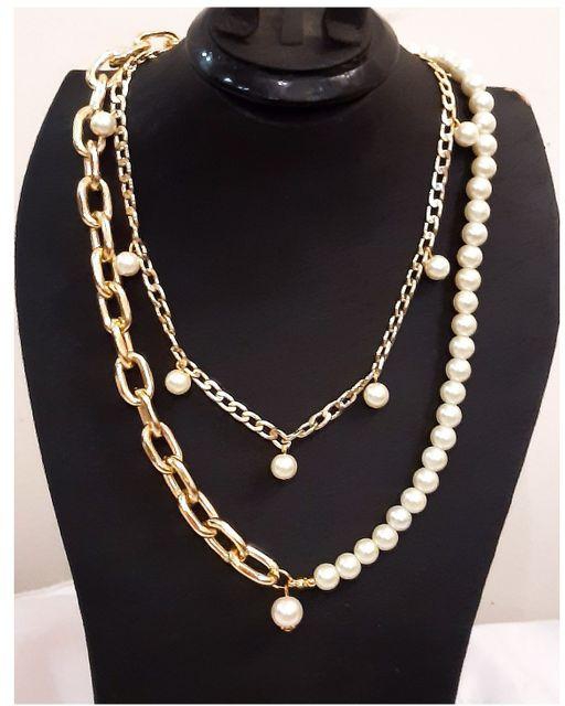 A Beautiful Necklace Of Off White Beads With Gold Chain