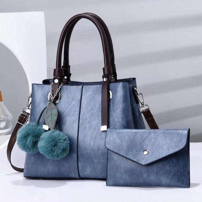 Fashion TWO IN 1 LUXURIOUS BLUE BAG WITH TWO FUR BALL CLOCHETTE