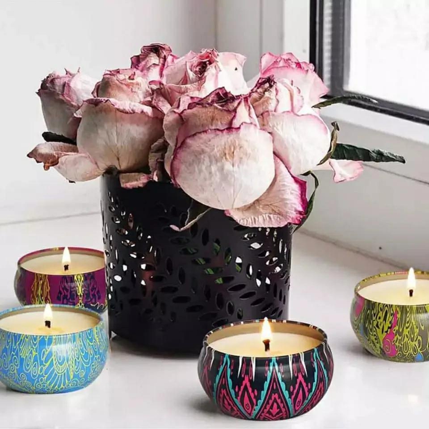 Scented candles Assorted flavors Available Keeps living space smelling great with the flowers scents