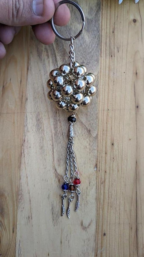 An Elegant Keychain Made Of Crystal And Silver Pendants (Silver)