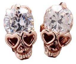 Womens earrings permission on the skull pattern decorated with a grain of crystal