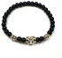 Black Beads Bracelet With A Skull Metal Charm Of Elegance.O.K.M