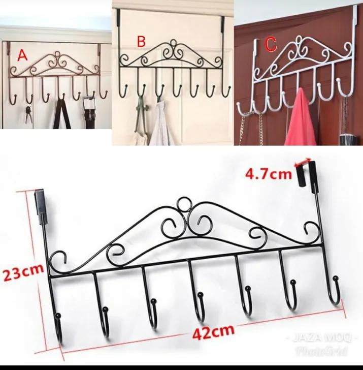 Genric Black Over The Door Hanger.- 7 Hooks,Portable, very stylish and elegant. Can be used to hang items like Aprons, cloths, house keys, bags etc. Durable and it's offered at a l