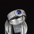 خاتم مكون من قطعتين لون فضي مزين بالزركون الشفاف و حجر بلون أزرق