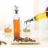 SHOWAY Glass Olive Oil Dispenser Bottle Set - 250ml Clear Oil &amp; Vinegar Cruet Bottle with Funnel -Olive Oil Bottles for Kitchen [2 PACK]