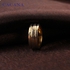 Womans Ring of Stainless steel plated with 18 carat gold is decorated with stripes (size 9) NO.R62