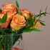 Orange Roses in Glass Vase
