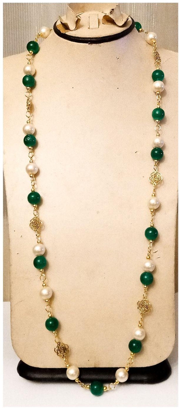 A Beautiful Necklace Of Off White And Green Beads