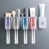 Wall mounted Toothbrush and toothpaste dispenser with 4 cups  Material: PP and PS Strong bearing capacity Punch free