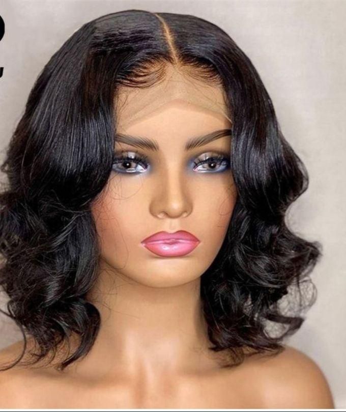 Bodywave Genuine Hair With 4x4 T Lace Closure Wig.
