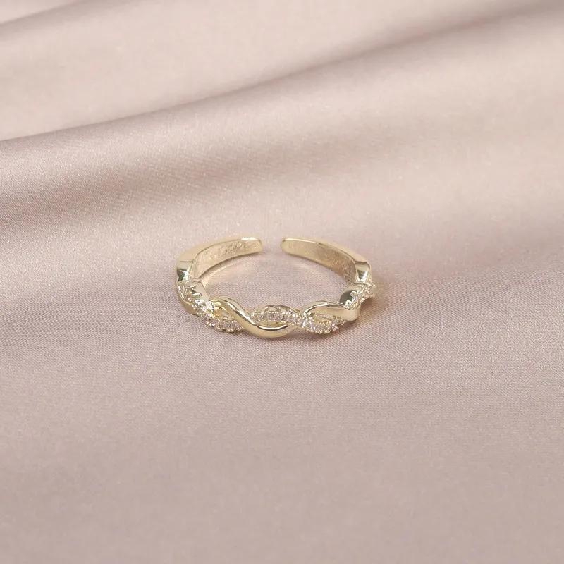 Korean new fashion jewelry 14K real gold plated zircon hollow twist ring elegant women's opening adjustable daily work rings